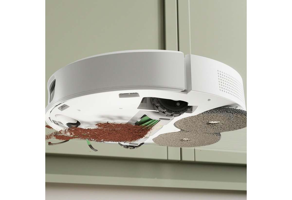 Φαίνεται η σκούπα να αποροφά σκόνη και βρωμίες από το πάτωμα.